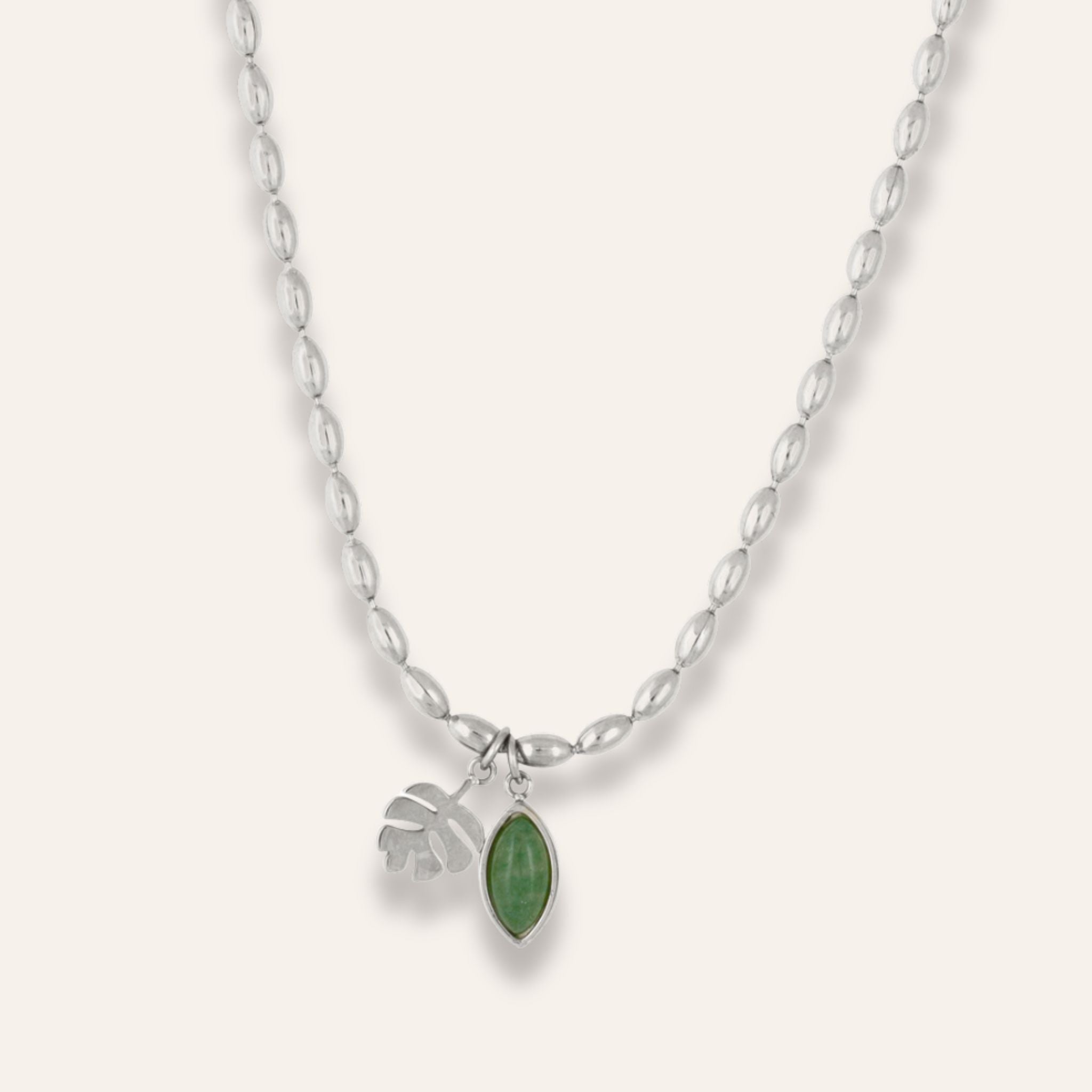 halsband  - med grön sten och ett blad