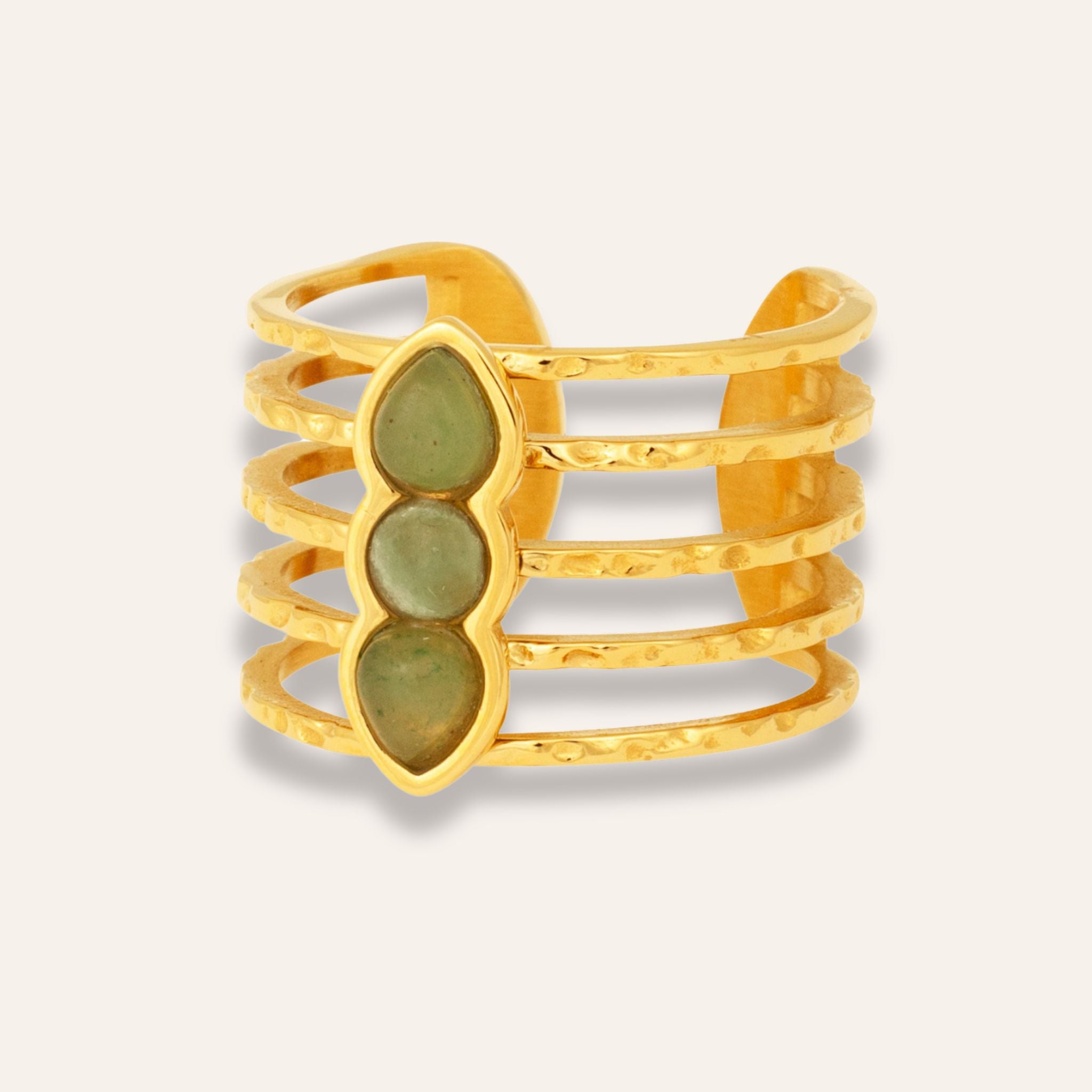 18 k guldpläterad ring med gröna stenar
