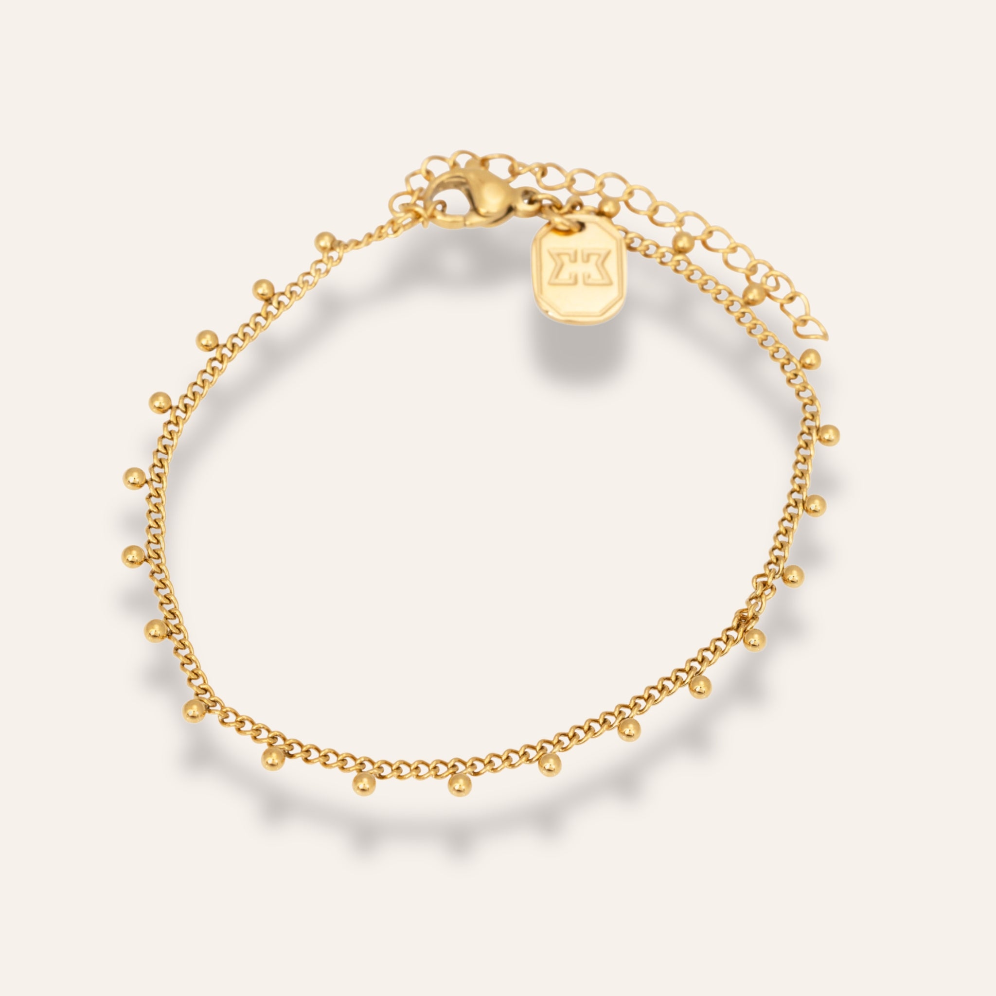 Golden beaded bracelet, Armbandet pryds av små kulor.