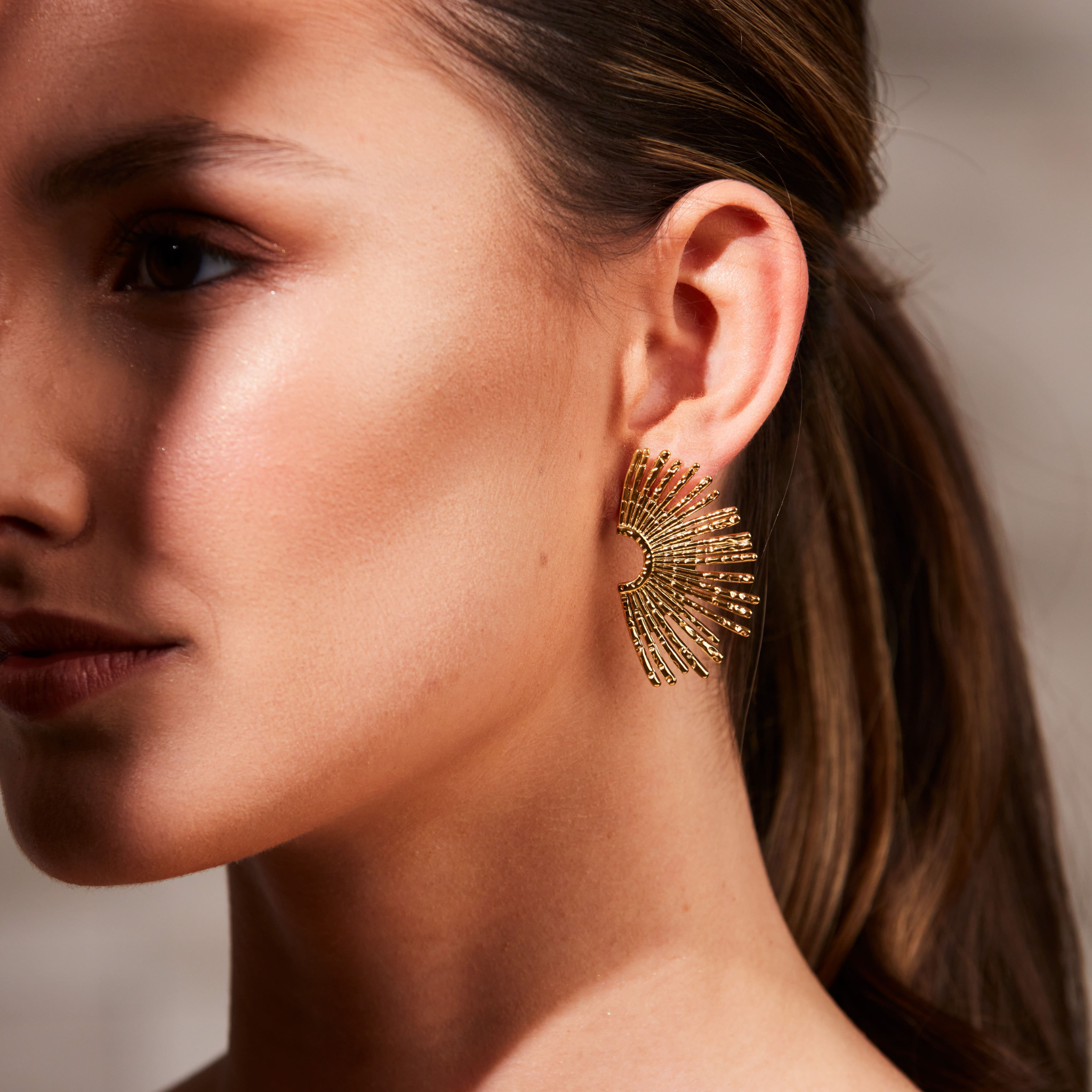 Earring golden feather