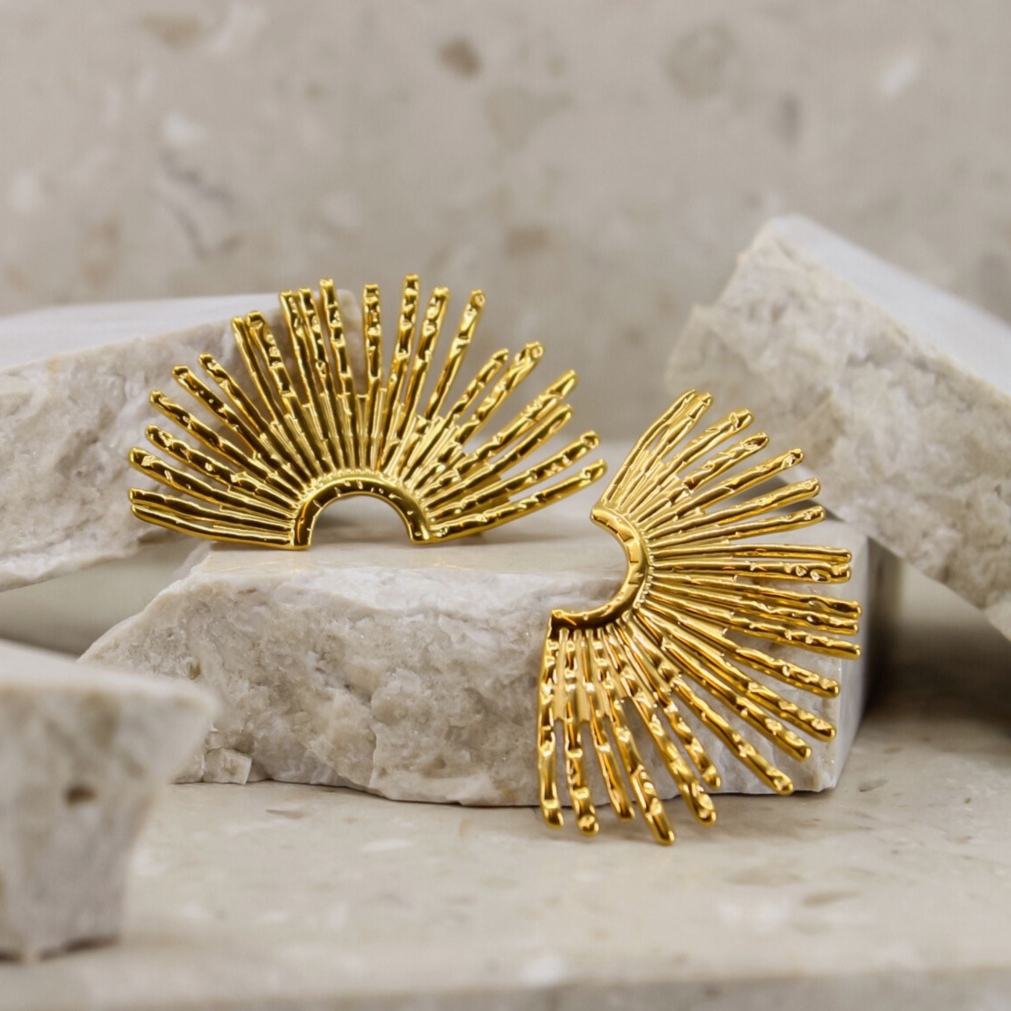 Earring golden feather